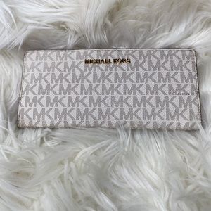 White and gray mickael kors wallet